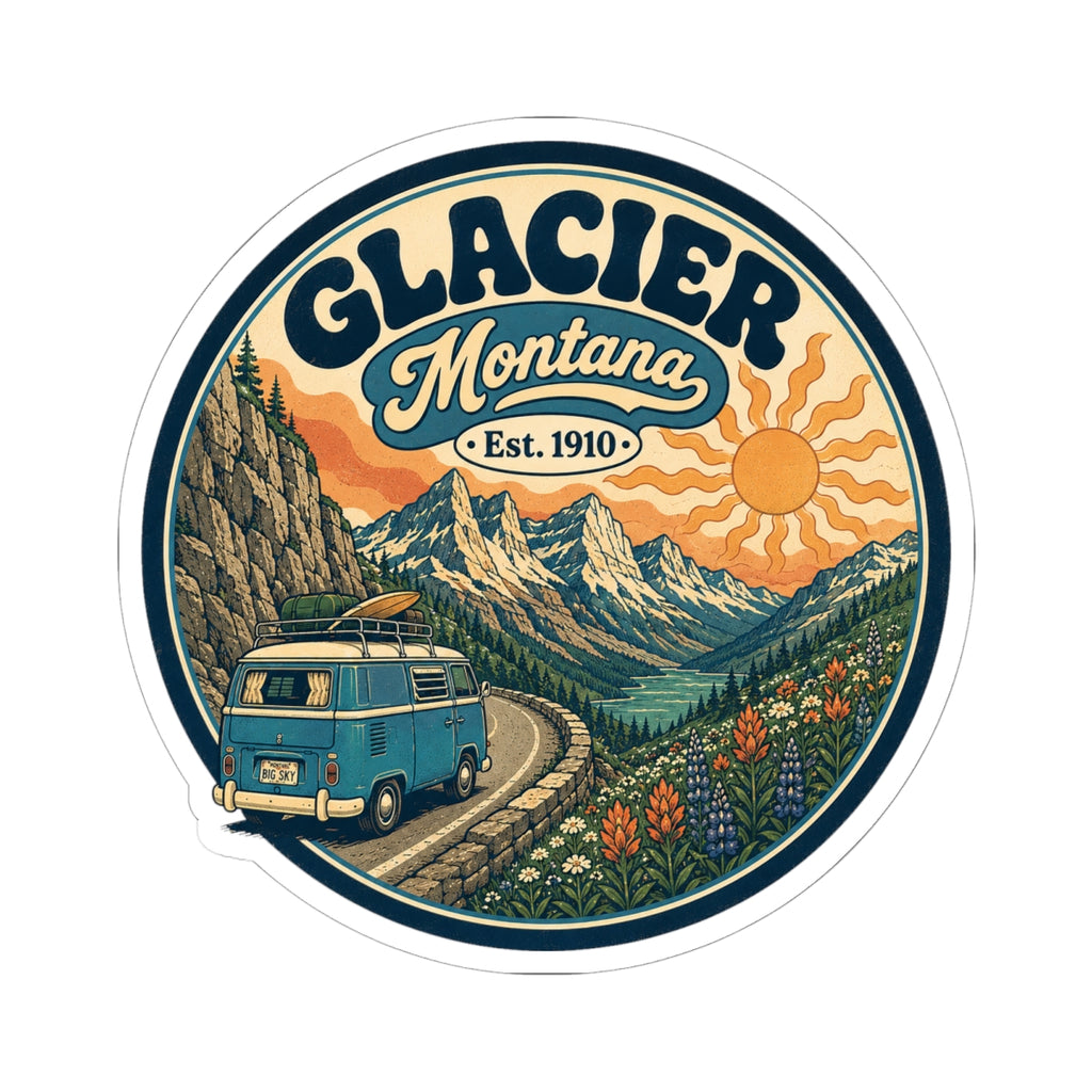 Round kiss-cut sticker featuring Glacier Montana lettering, mountain peaks, orange sun, and wildflowers
