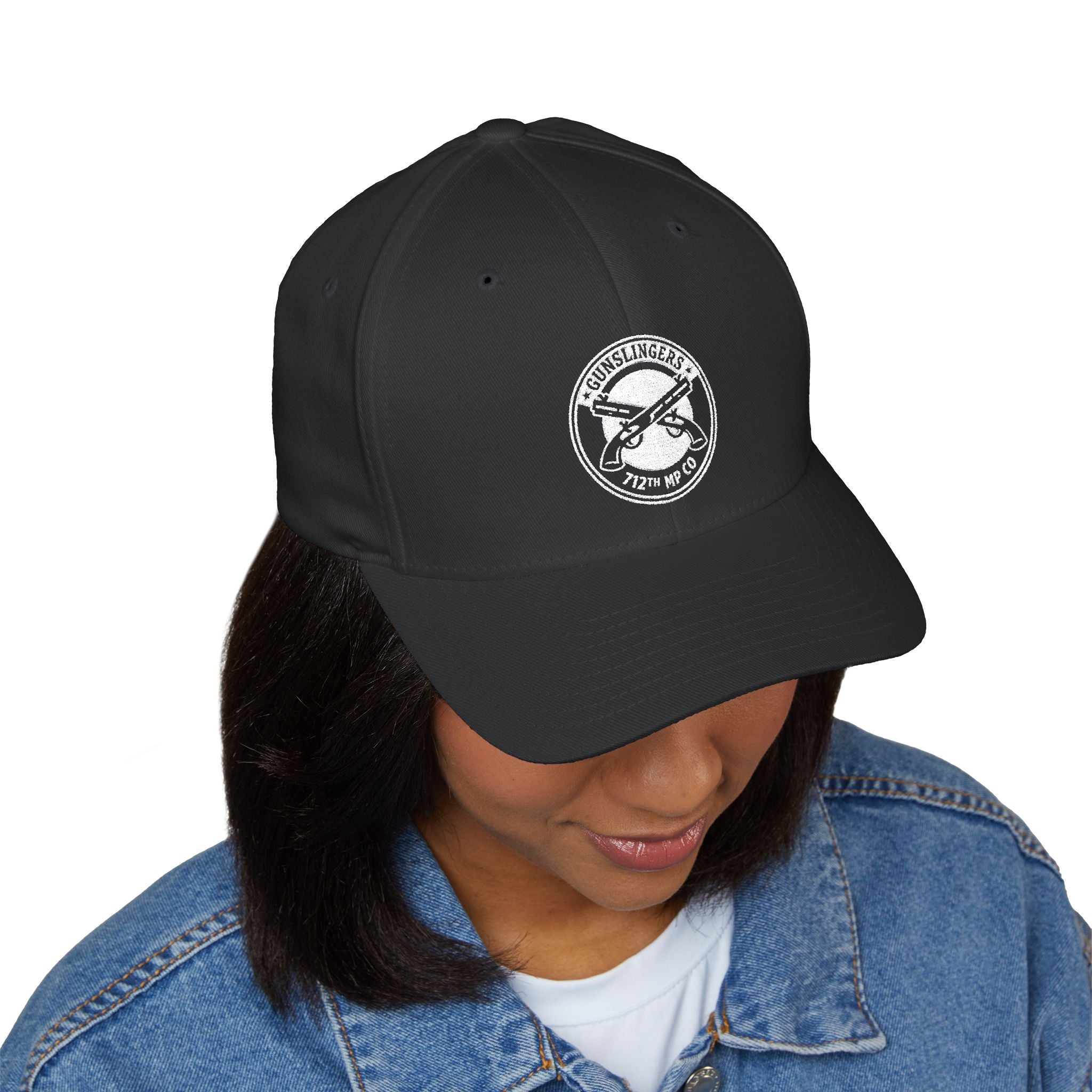 Embroidered baseball cap, black, with circular white badge emblem