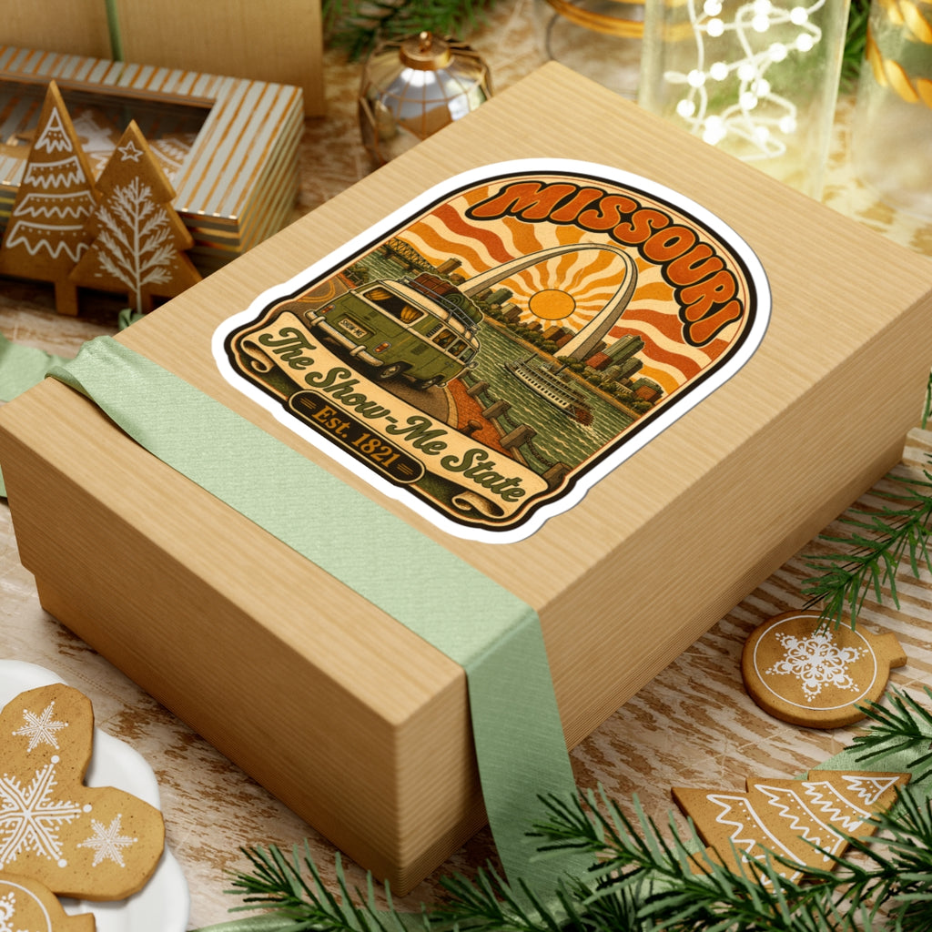 Missouri retro roadtrip sticker on a wrapped gift box, bus and riverboat under arch sun
