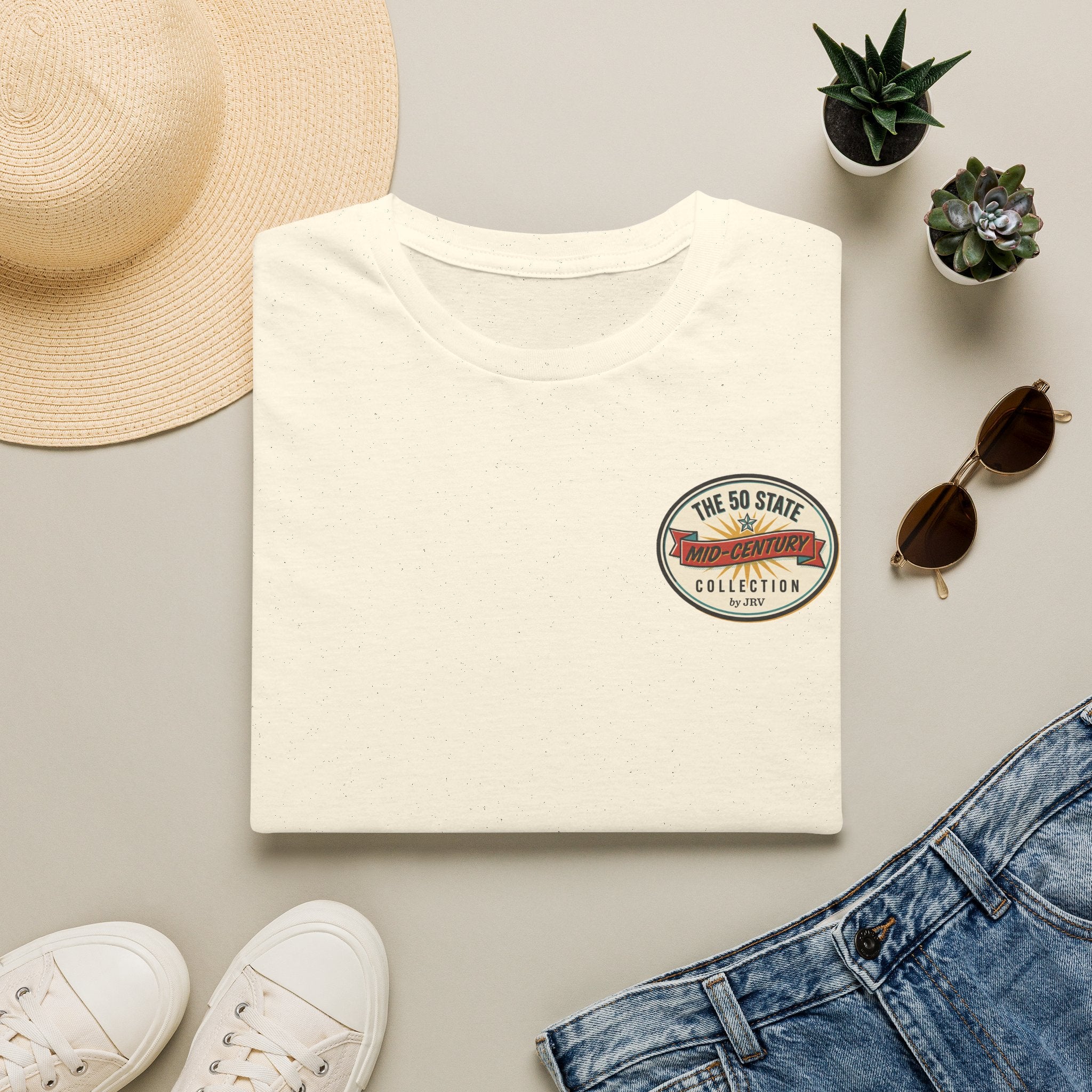 Alaska travel badge T-shirt, white crewneck with round chest emblem
