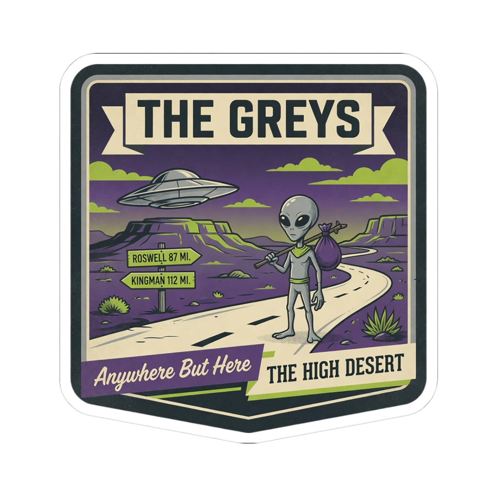 Die-cut sticker with alien and UFO over desert road, text "THE GREYS".
