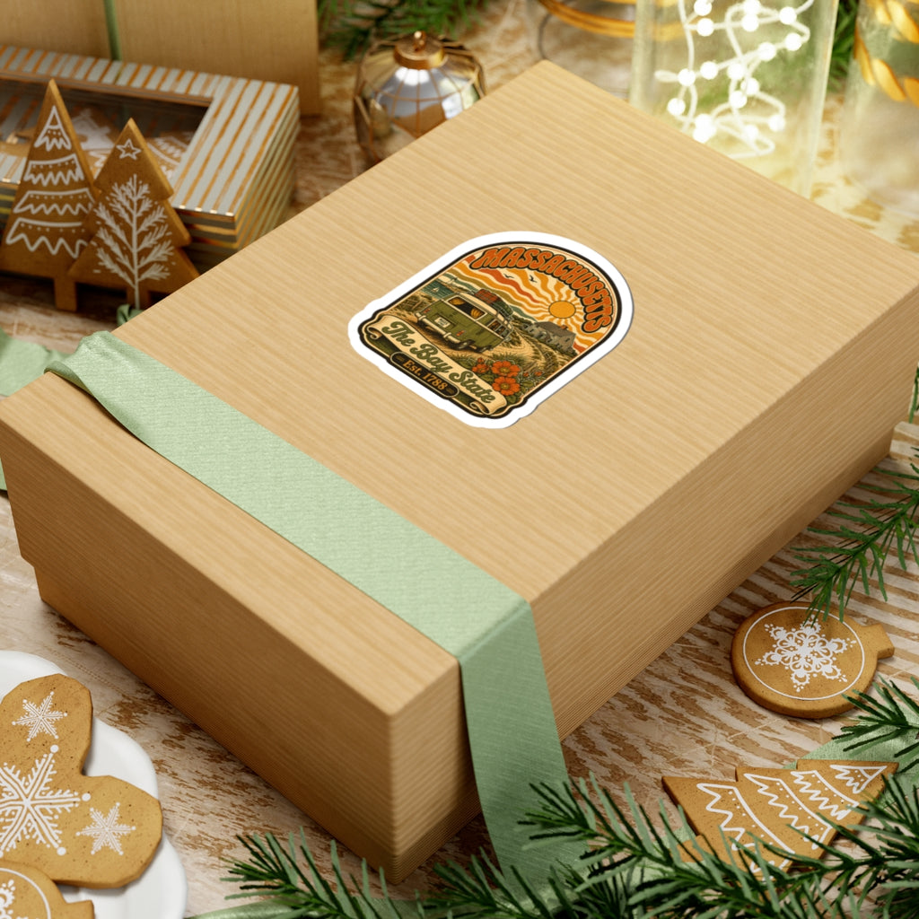Massachusetts sticker on a wrapped gift box, featuring vintage van and Bay State text
