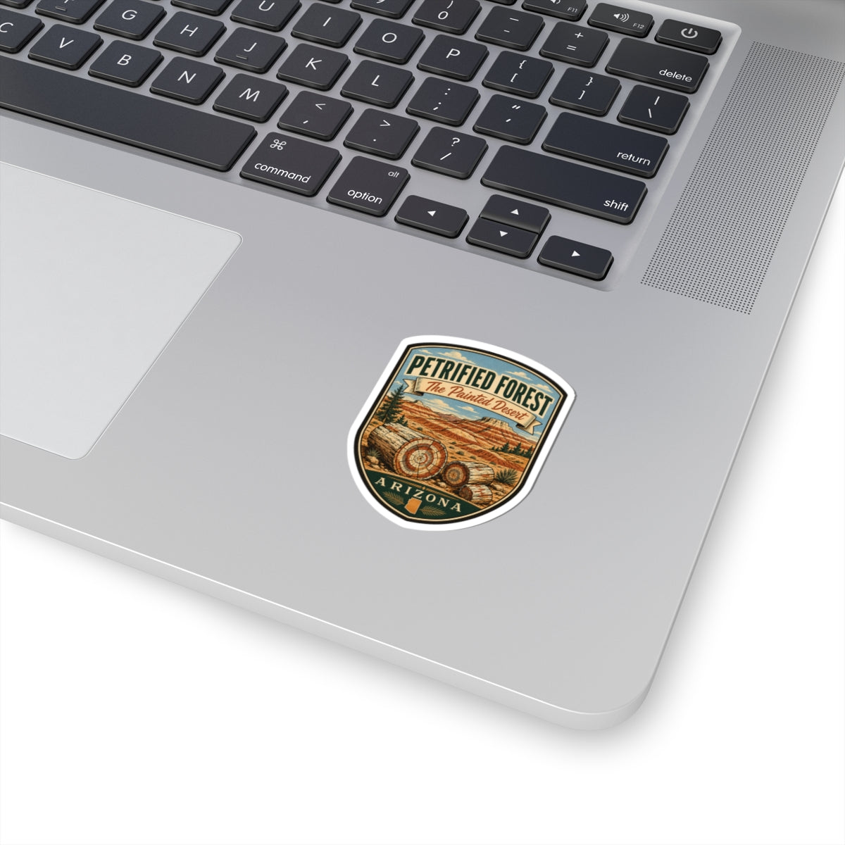 Petrified Forest Arizona travel sticker with vintage desert landscape and circular border