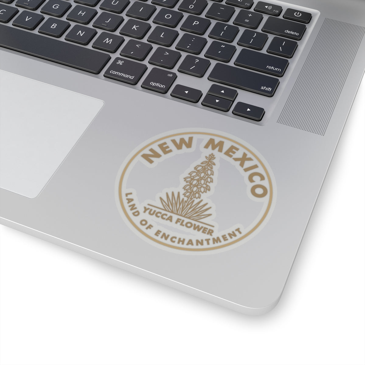 Yucca flower New Mexico seal sticker on laptop lid, transparent vinyl decal