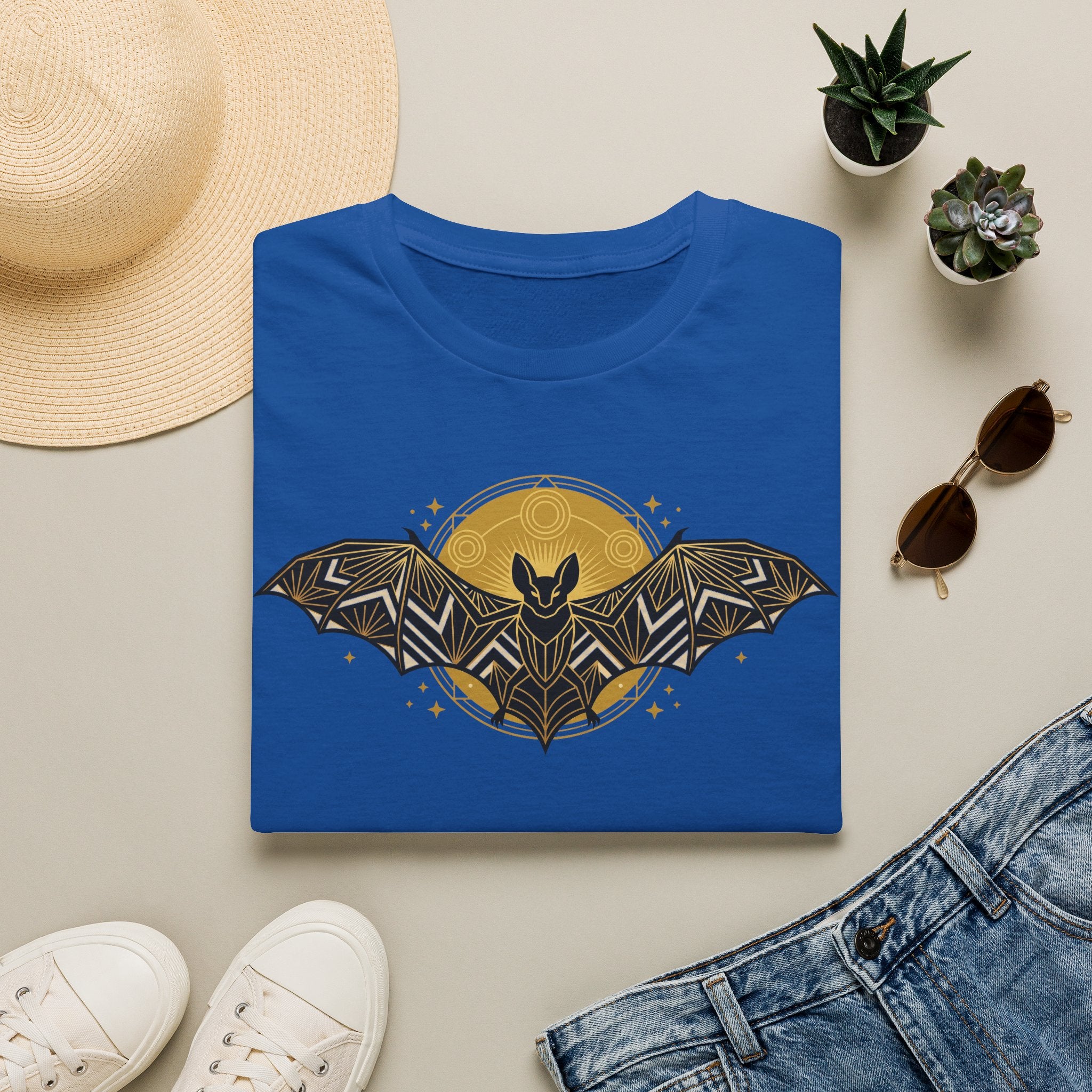 Royal blue T-shirt with gold geometric bat and moon graphic