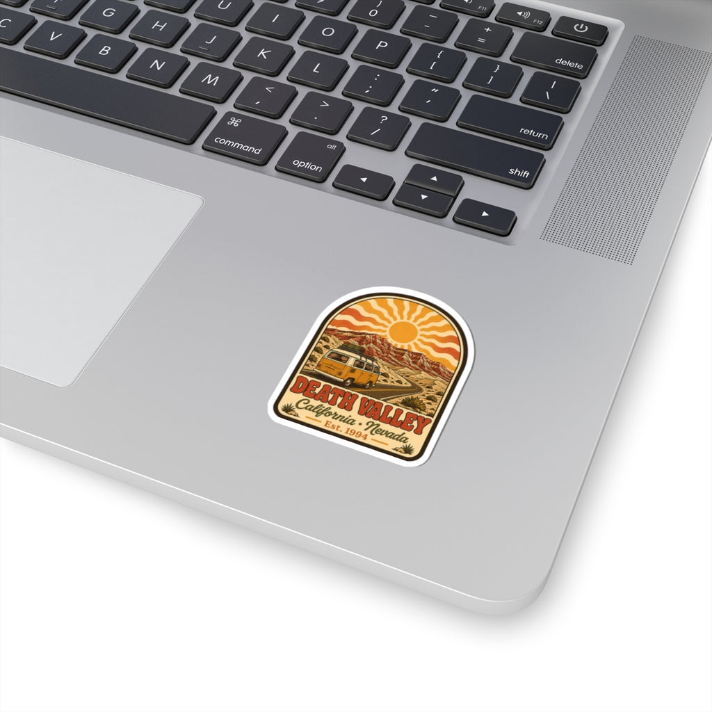 Arched vintage desert landscape sticker with camper van, bright sun, and decorative border