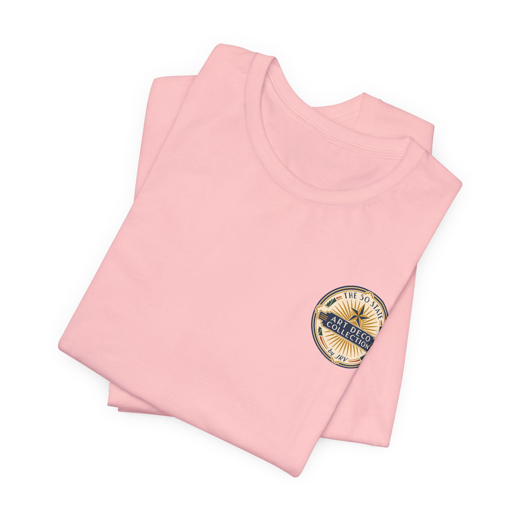 Pink T-shirt folded with small circular bison logo on front