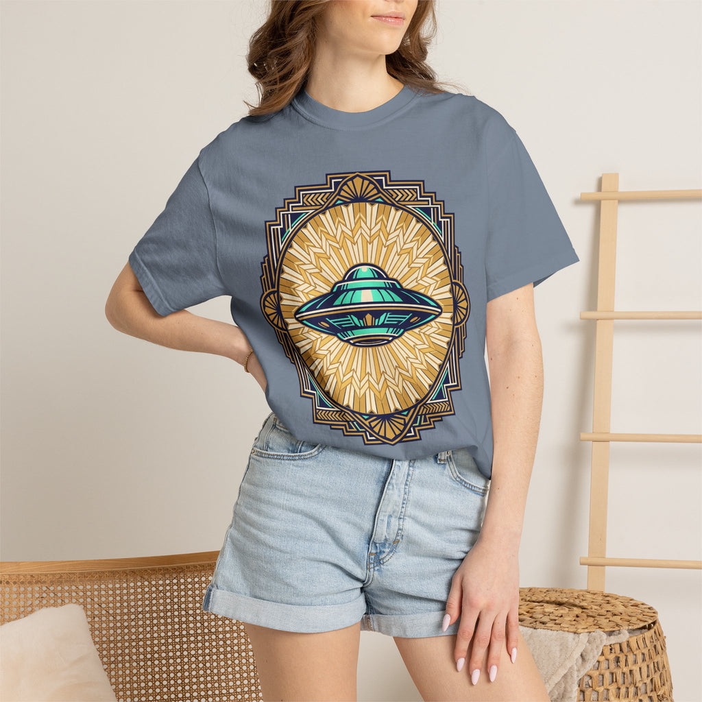Blue T-shirt with retro UFO graphic and sunburst emblem, worn by model