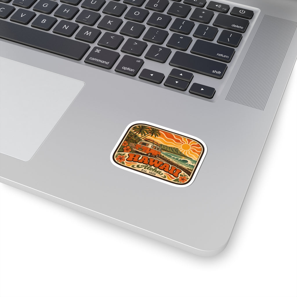 Rounded white-bordered sticker with retro camper van, palms, and orange surf sunset scene