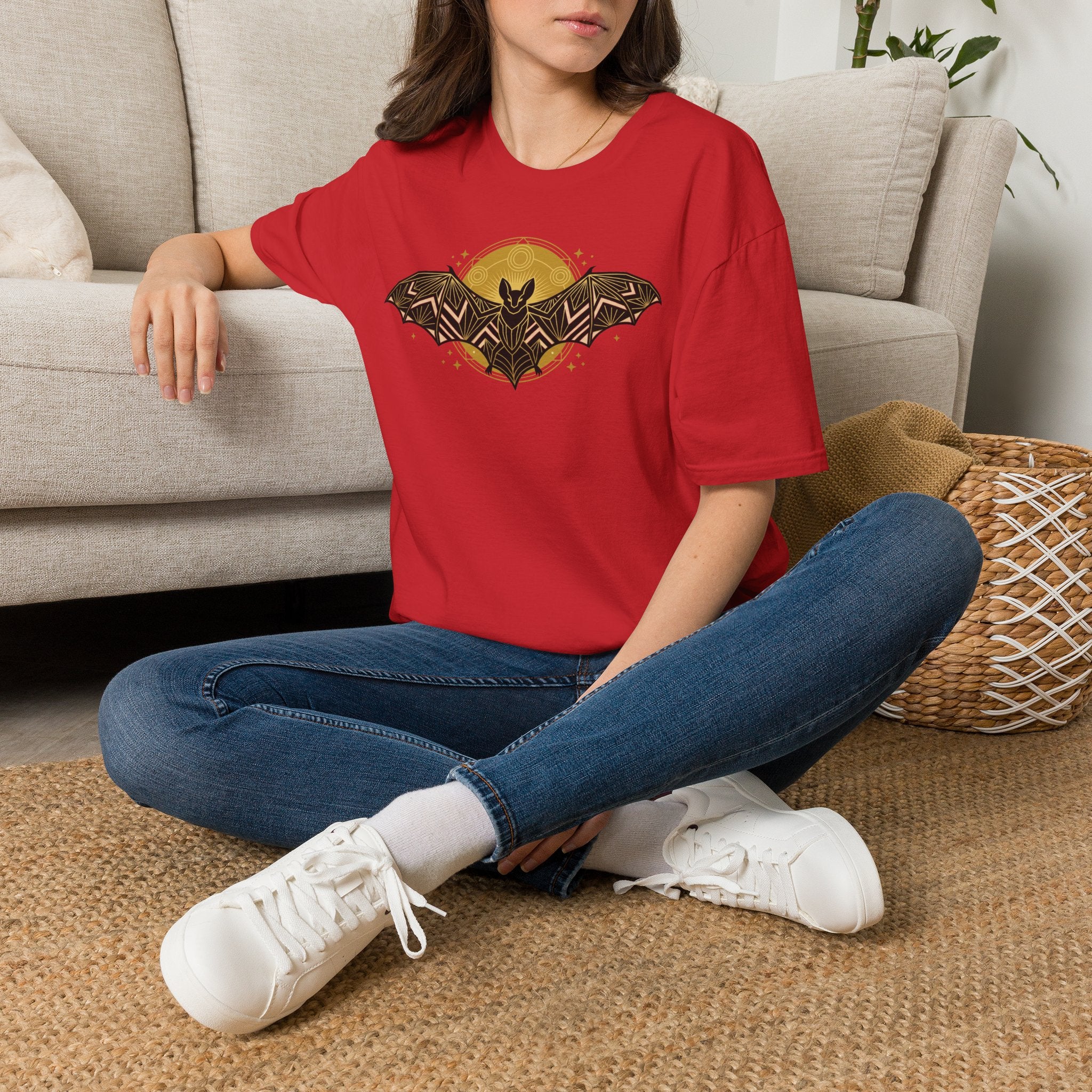 Red short-sleeve T-shirt with geometric bat graphic
