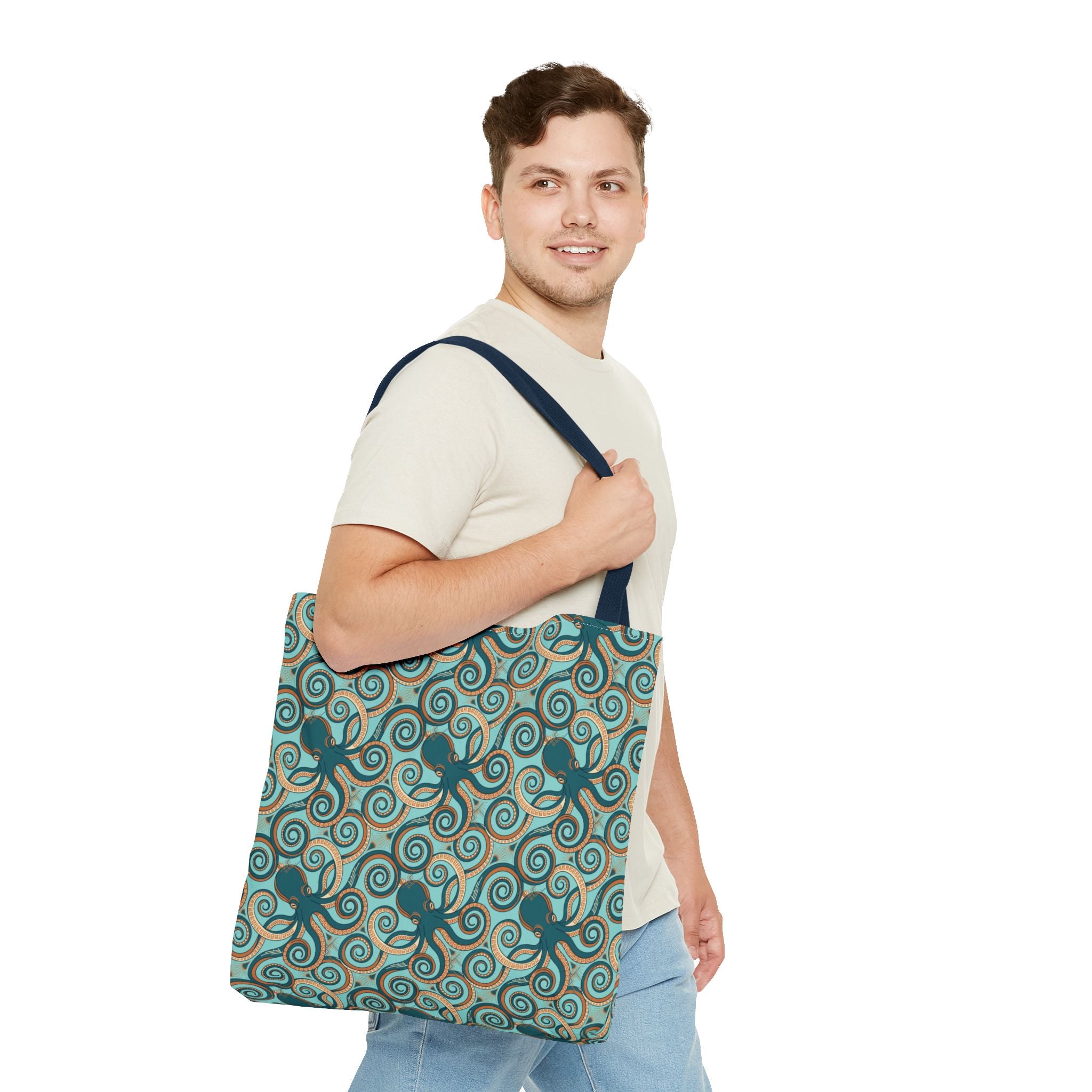 Teal octopus swirl tote bag with navy handles, front view with full pattern.
