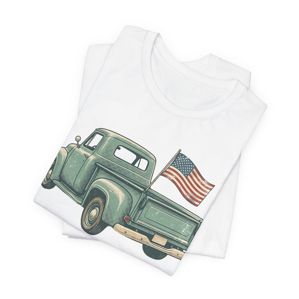 White T-shirt with green pickup truck and American flag graphic