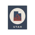 Utah metal art sign with oval emblem and red-blue retro arch graphic, text UTAH