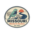 Round Missouri Bluebird & Hawthorn sticker with teal bird, flowers, and bold “MISSOURI” text