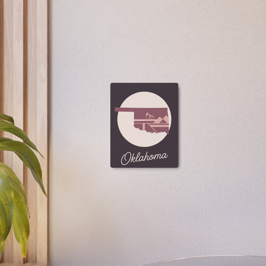 Small mauve Oklahoma metal wall art sign with circular graphic and “Oklahoma” script