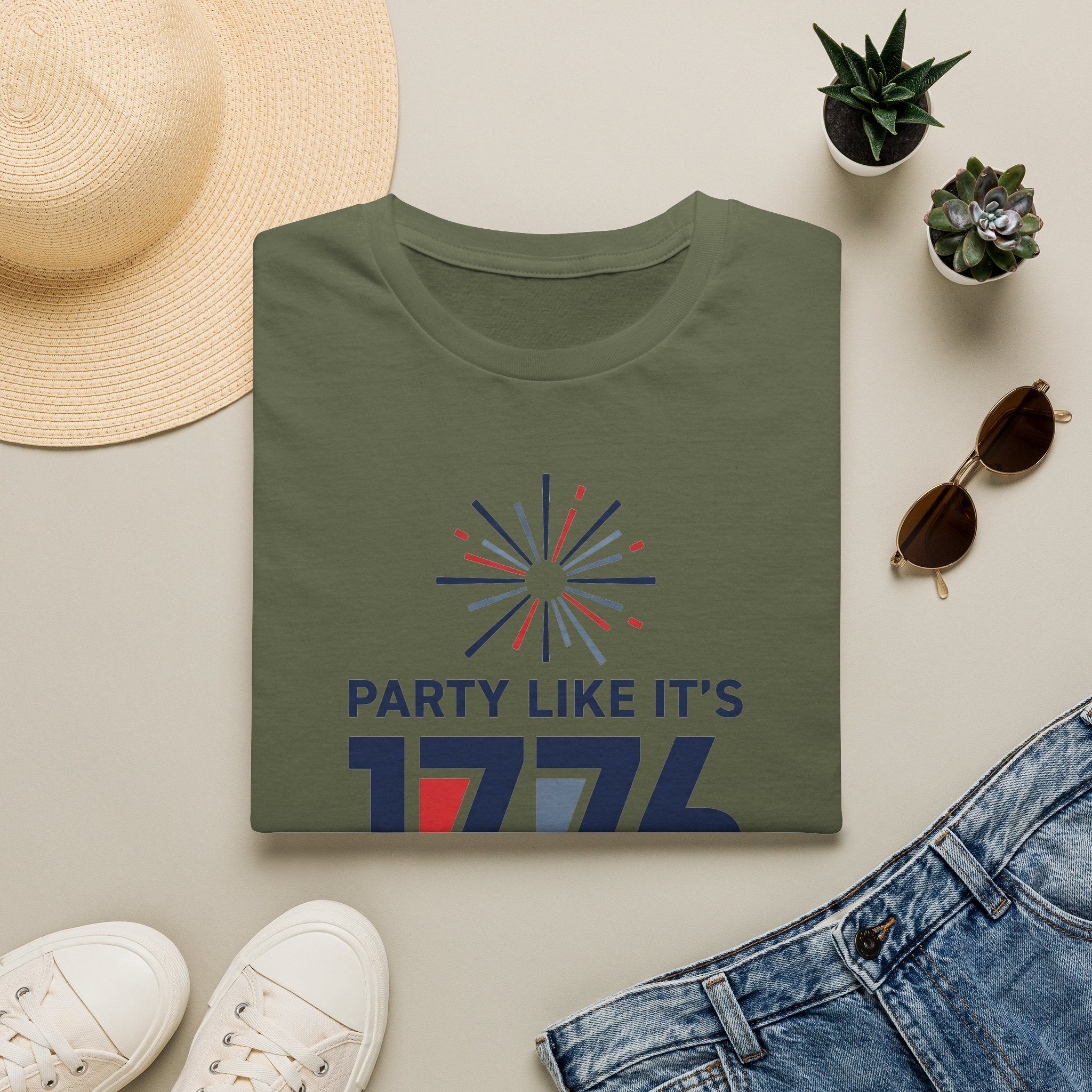 Military green T-shirt with fireworks graphic and text “PARTY LIKE IT’S 1776”