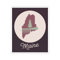 Mauve Maine state silhouette vinyl decal with green pine tree and 'Maine' script on dark square.