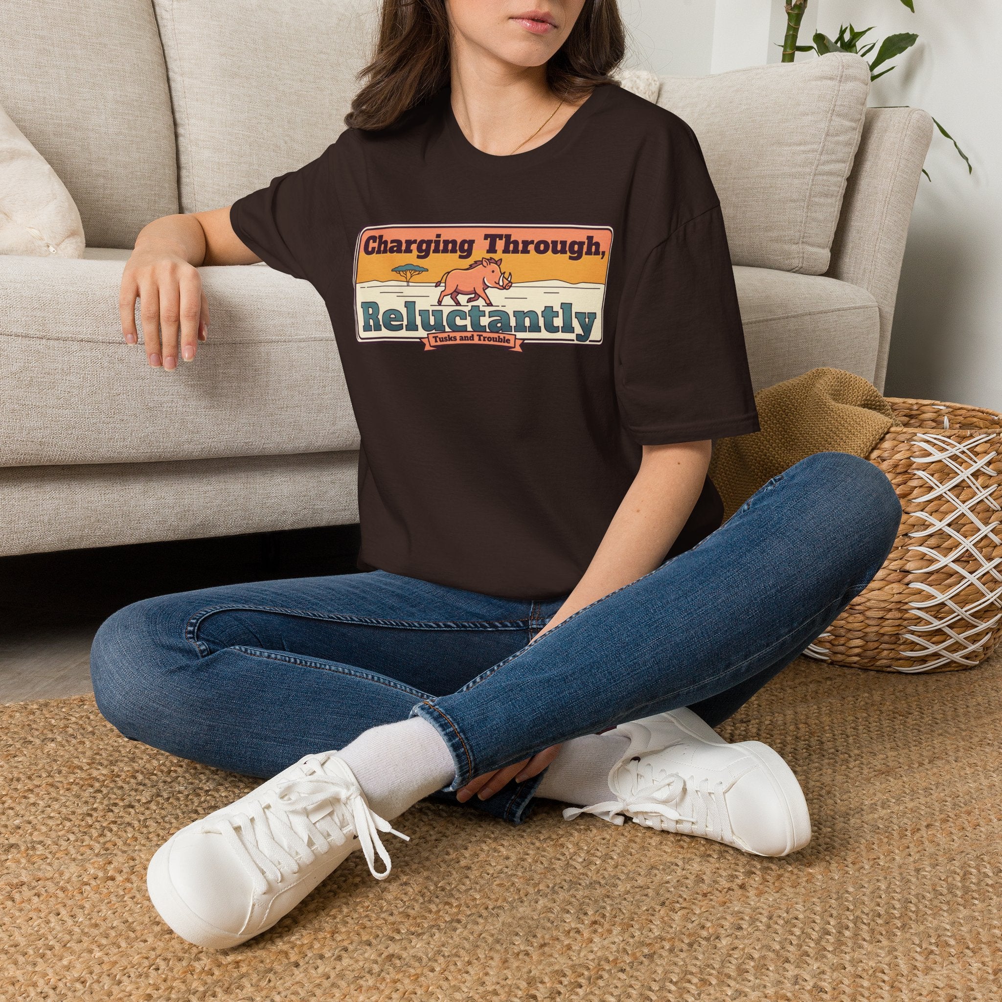 Dark chocolate T-shirt with charging-through and reluctantly graphic on the front