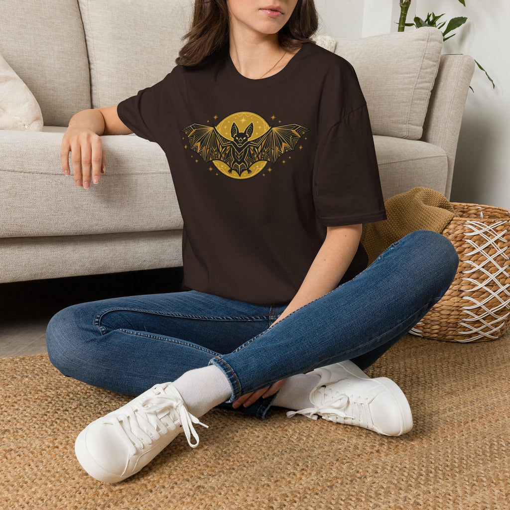 Dark brown T-shirt with gold bat-and-moon graphic on the chest