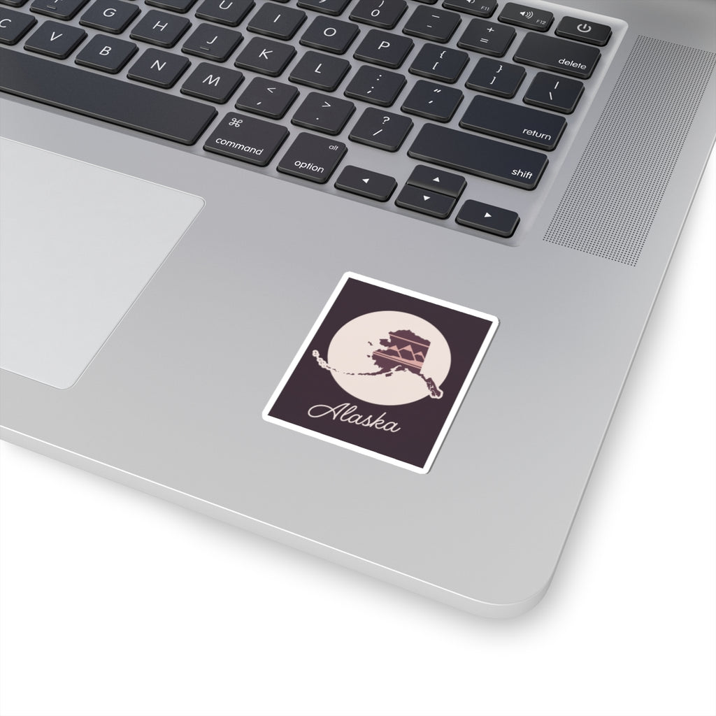 Square mauve Alaska state silhouette vinyl sticker with dark purple border and cursive text
