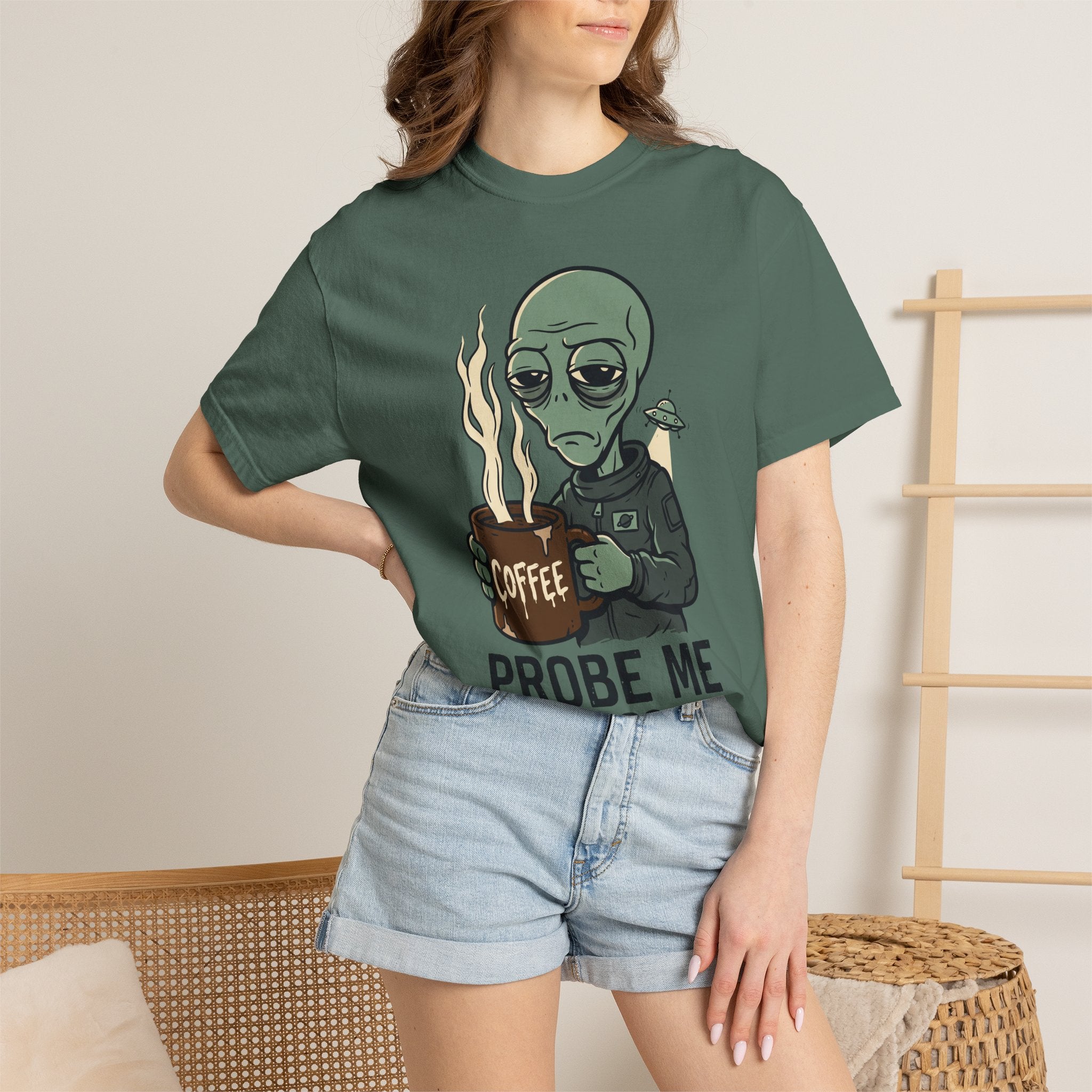 Dark green alien coffee T-shirt on model, crew neck short sleeves with front print
