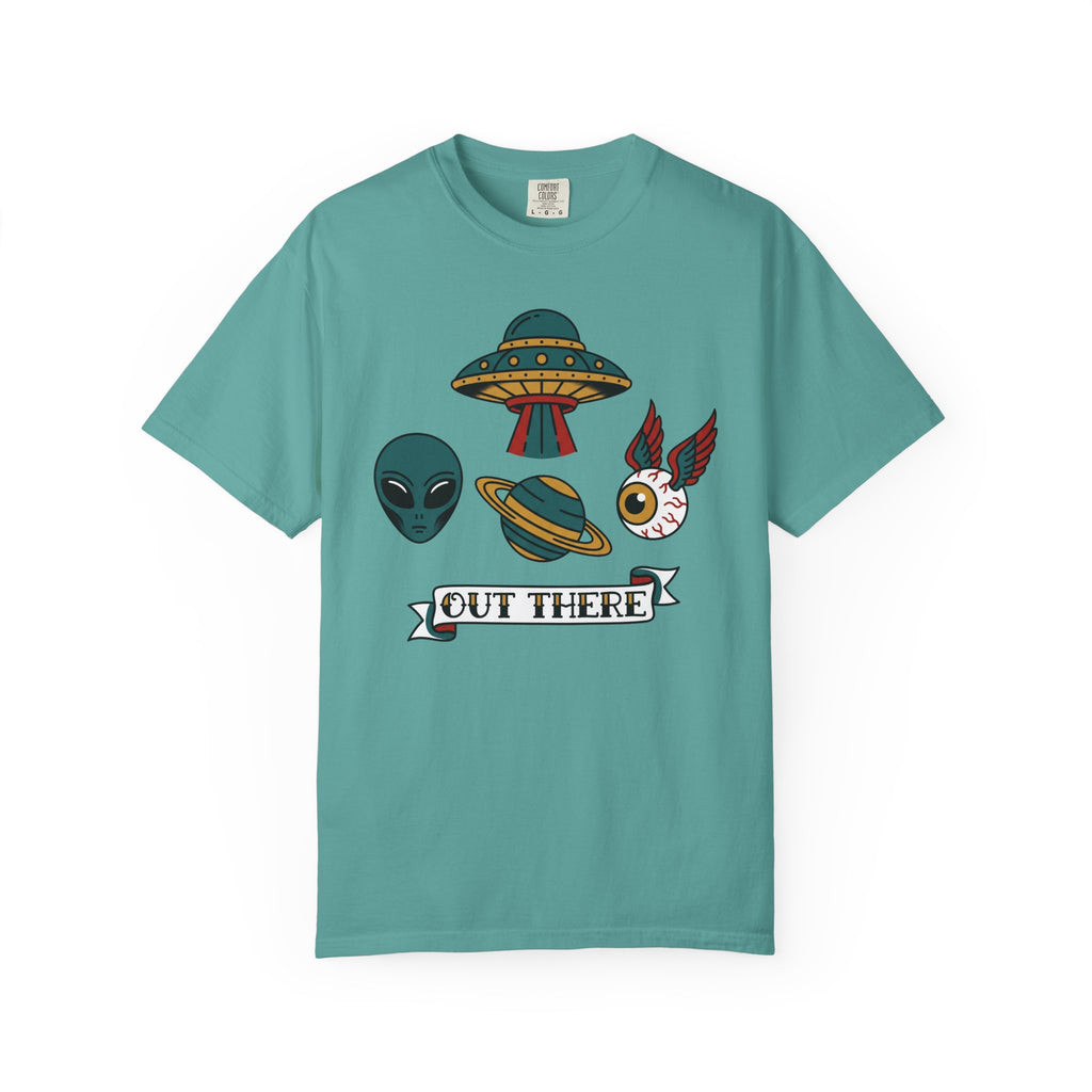Teal T-shirt with alien, UFO, and “OUT THERE” banner graphic at center